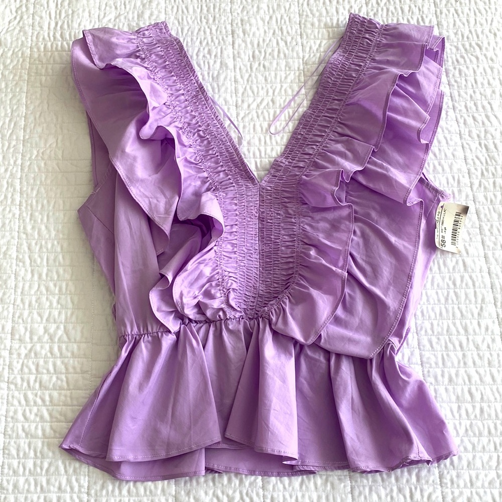 The Impeccable Pig Lavender Ruffle V-Neck Peplum Top